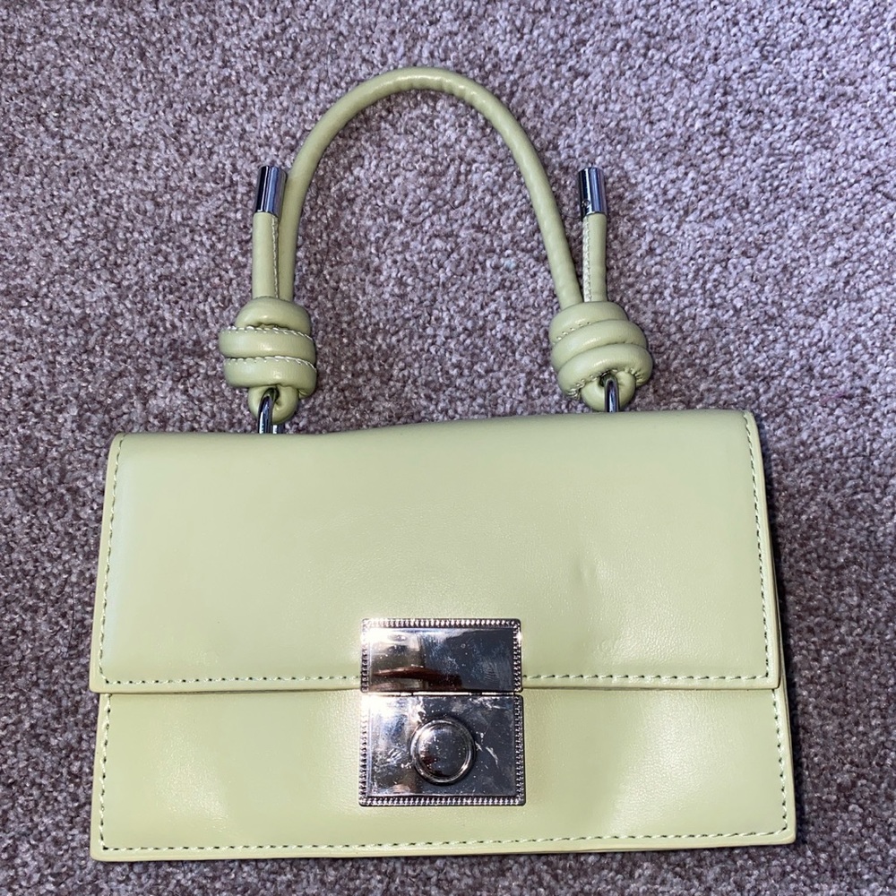 Never used. Can be used as crossbody or Handbag